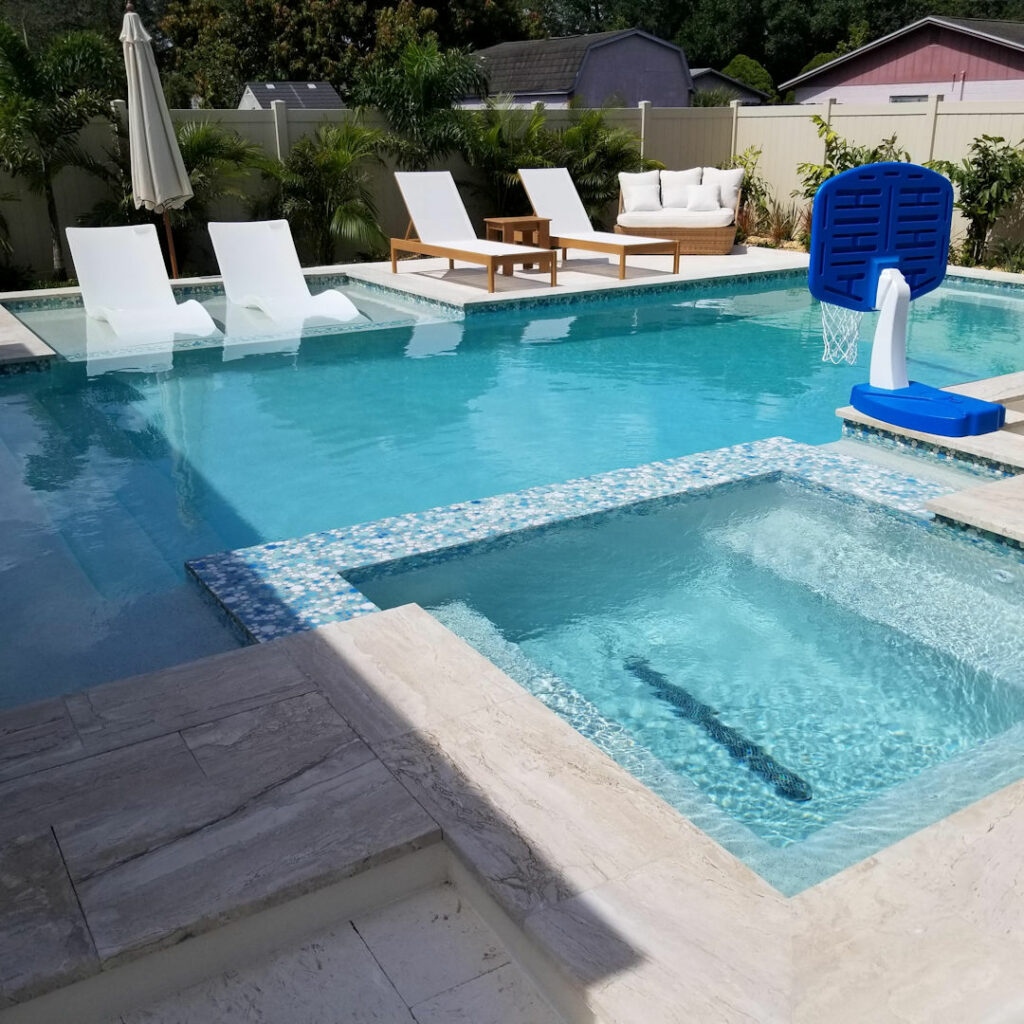 Custom Pool-Spa With Sunshelf Odessa
